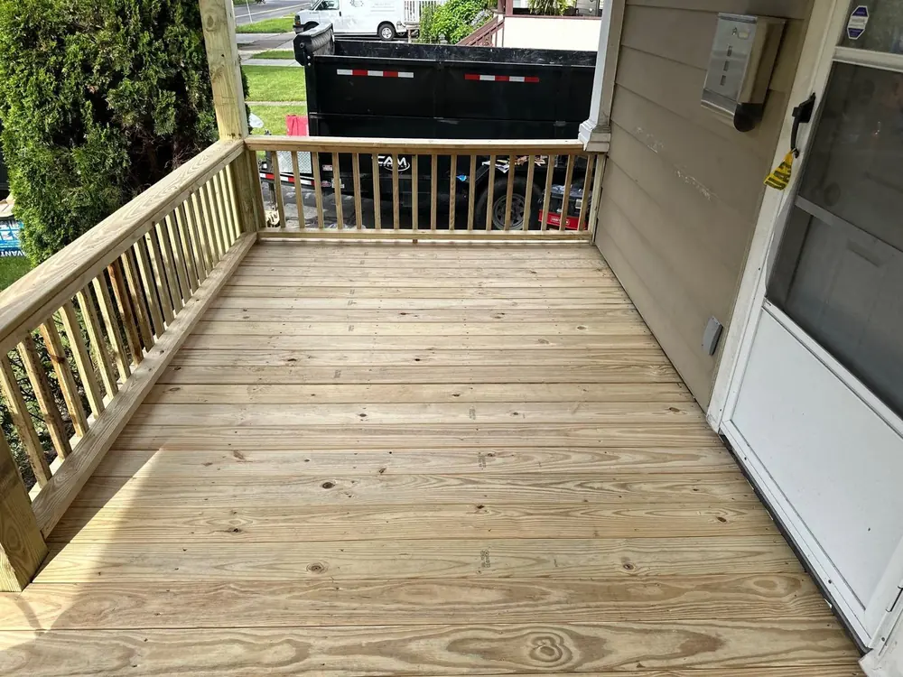 New porch floor and railing addition in Buffalo, NY