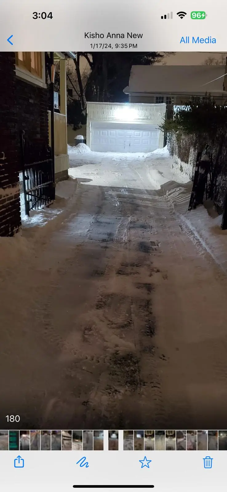 Driveway plowed clean at dusk in Buffalo, NY