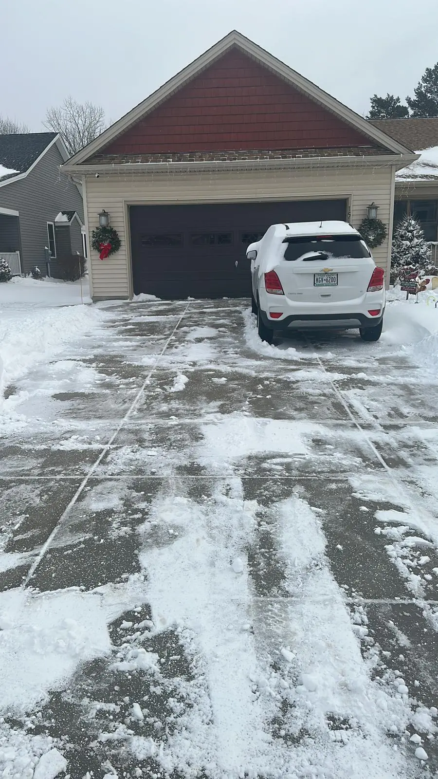 Driveway plowed clean up to the garage in Buffalo, NY